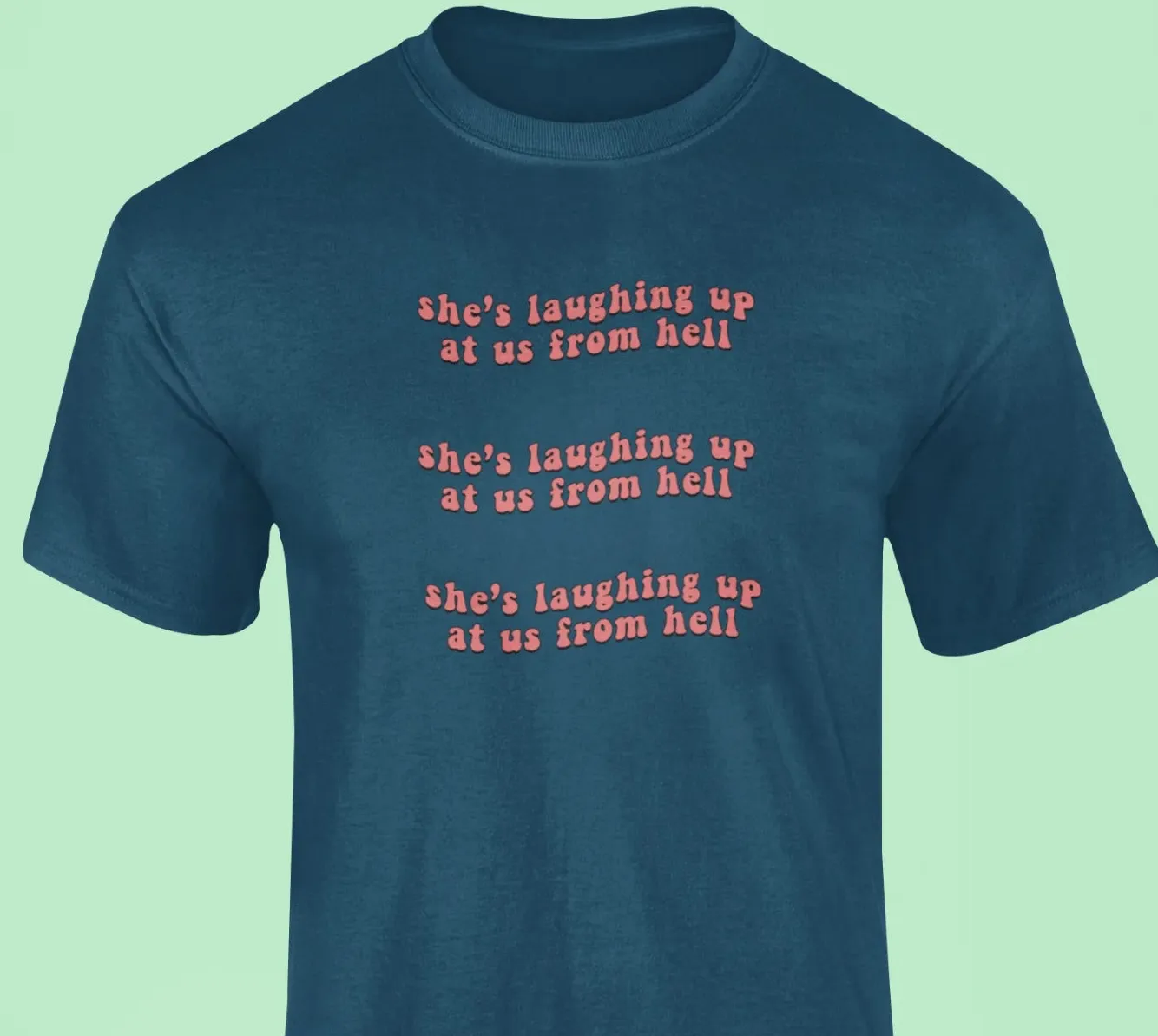 She's laughing up at us from hell T-Shirt